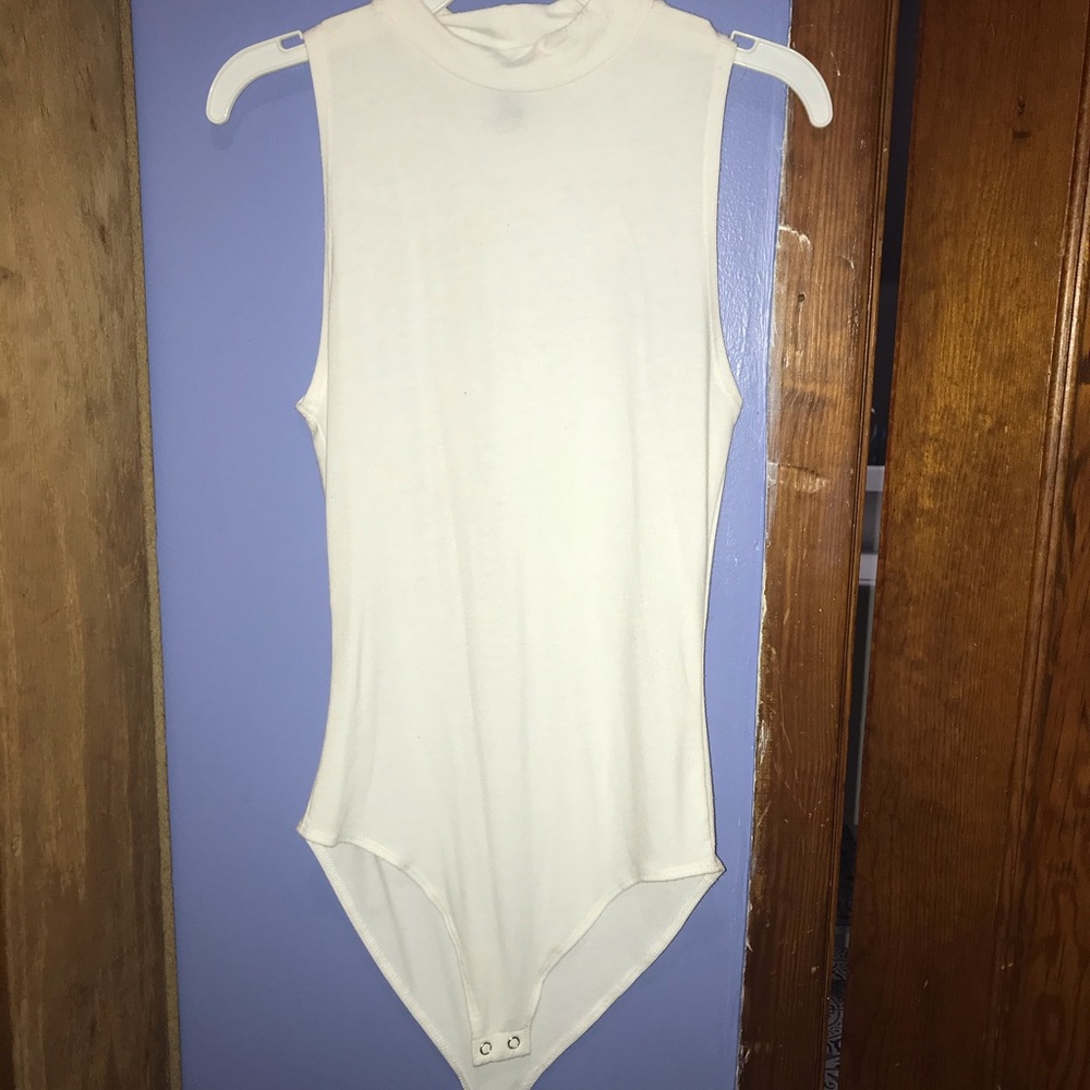 White sleeveless bodysuit, Hardly Worn !